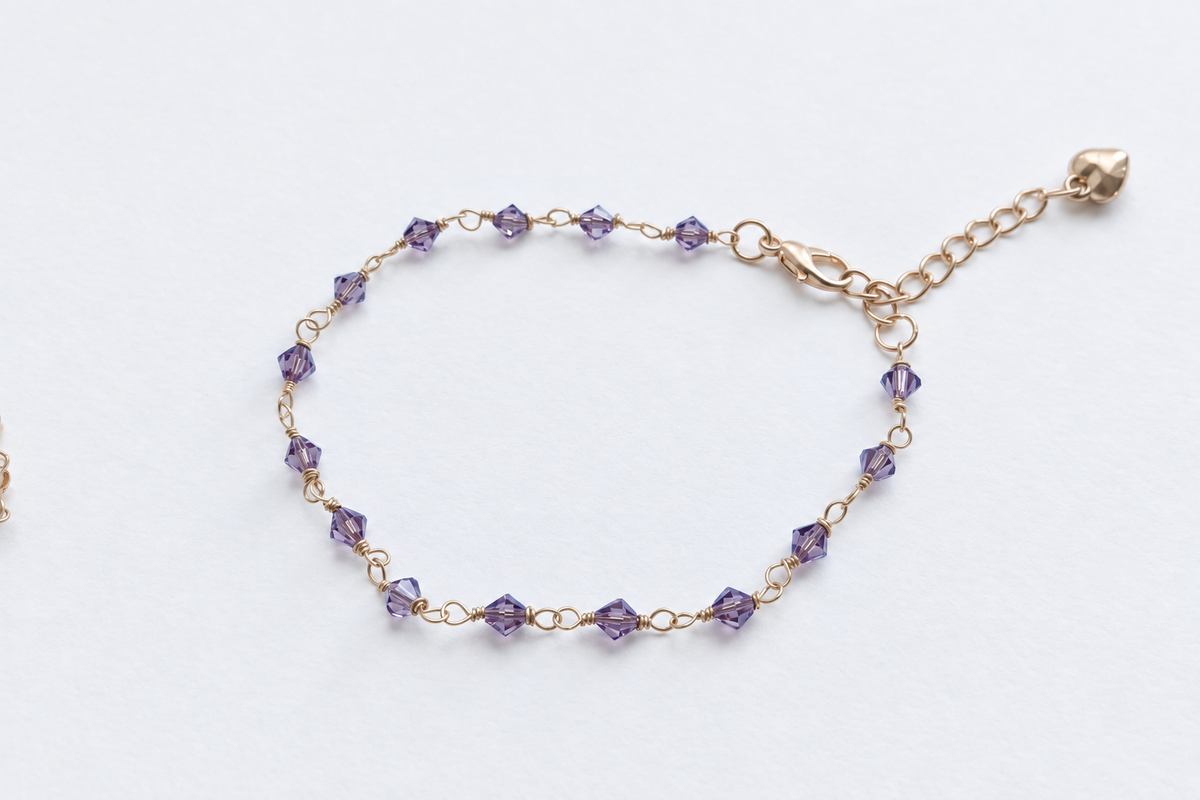 Armband med lila biconkristaller